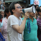 A man protesting against Occupy Central in Mong Kok yelled from a megaphone, “You can’t stop our children from going to school.”